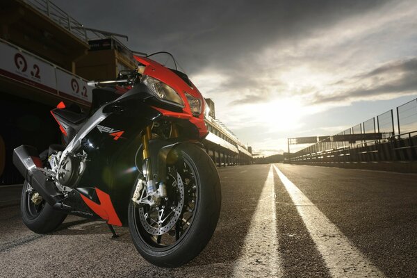 Red sports motorcycle on the race track