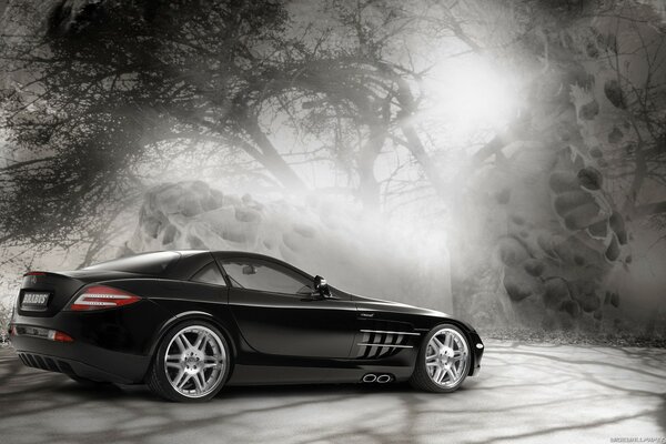 Painted black Mercedes on a gray background