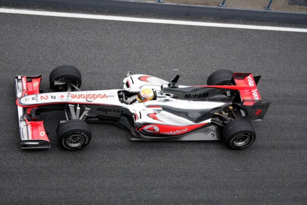 Lewis Hamilton driving a McLaren car