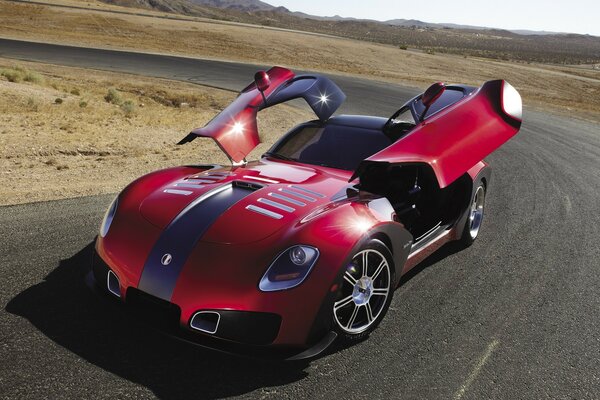 Coche deportivo rojo con puertas abiertas