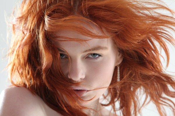 Beautiful redhead girl posing