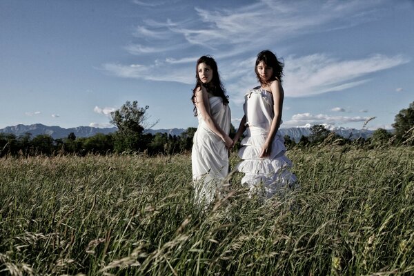 Girlfriends in nature under the sun