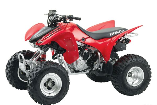 Rouge Honda tr300 atv. Vue latérale