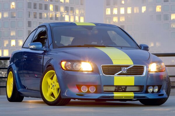 Tuned Volvo with yellow wheels