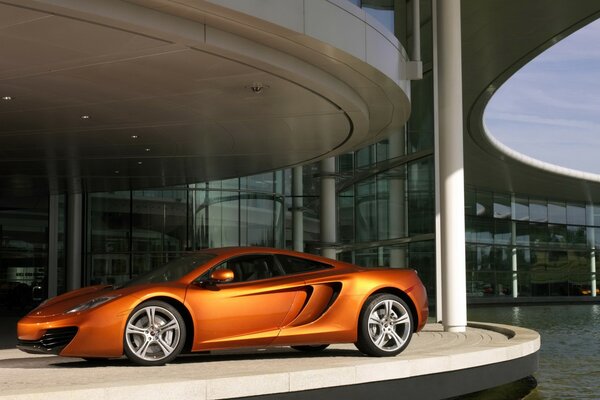 Orange car in a circular parking lot