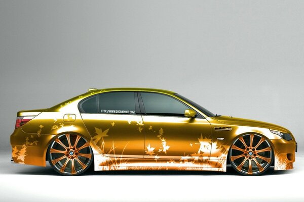 BMW gold car with airbrushing