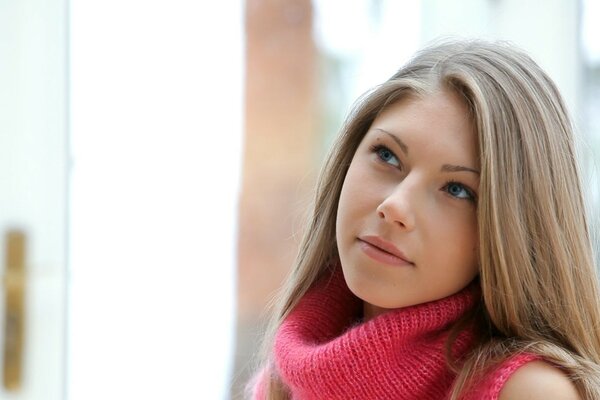 The look of a beautiful blonde girl in pink