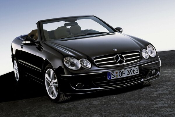 Black Mercedes convertible on black