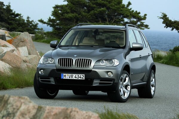 BMW brand car on a mountain serpentine