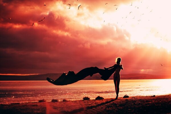 Red sunset and a girl with a scarf