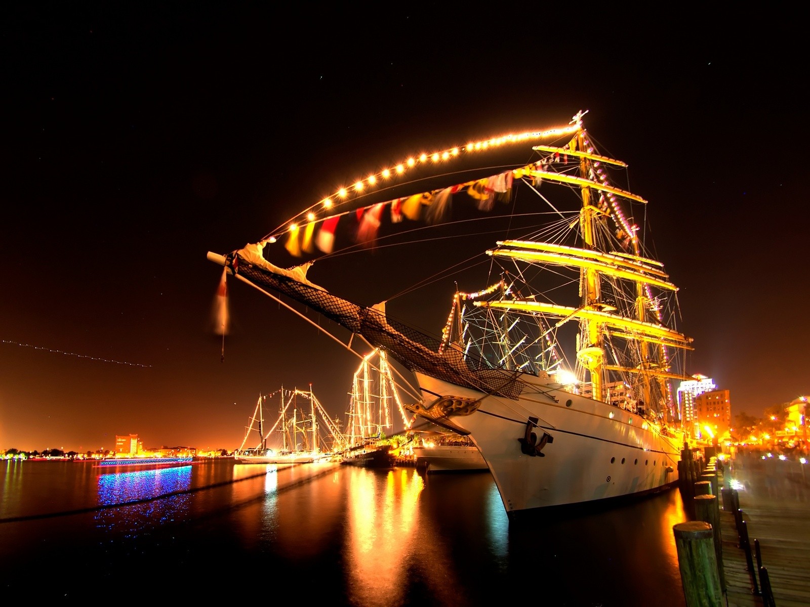 hip pier embankment night lights sea