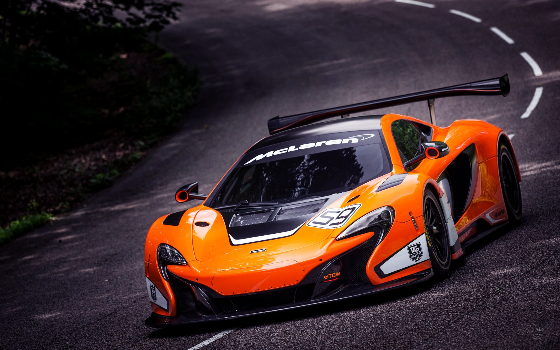 mclaren 650s gt3 coche deportivo superdeportivo coche naranja frente capó en movimiento asfalto