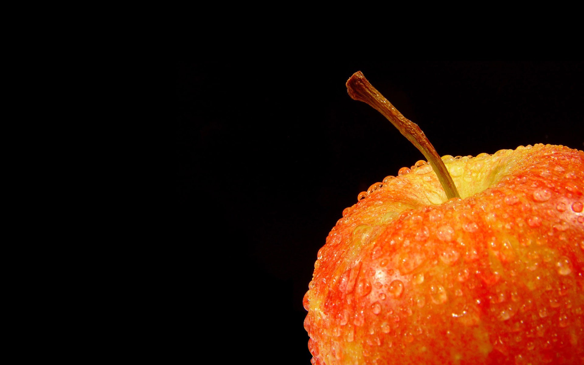 apfel tropfen schwarzer hintergrund