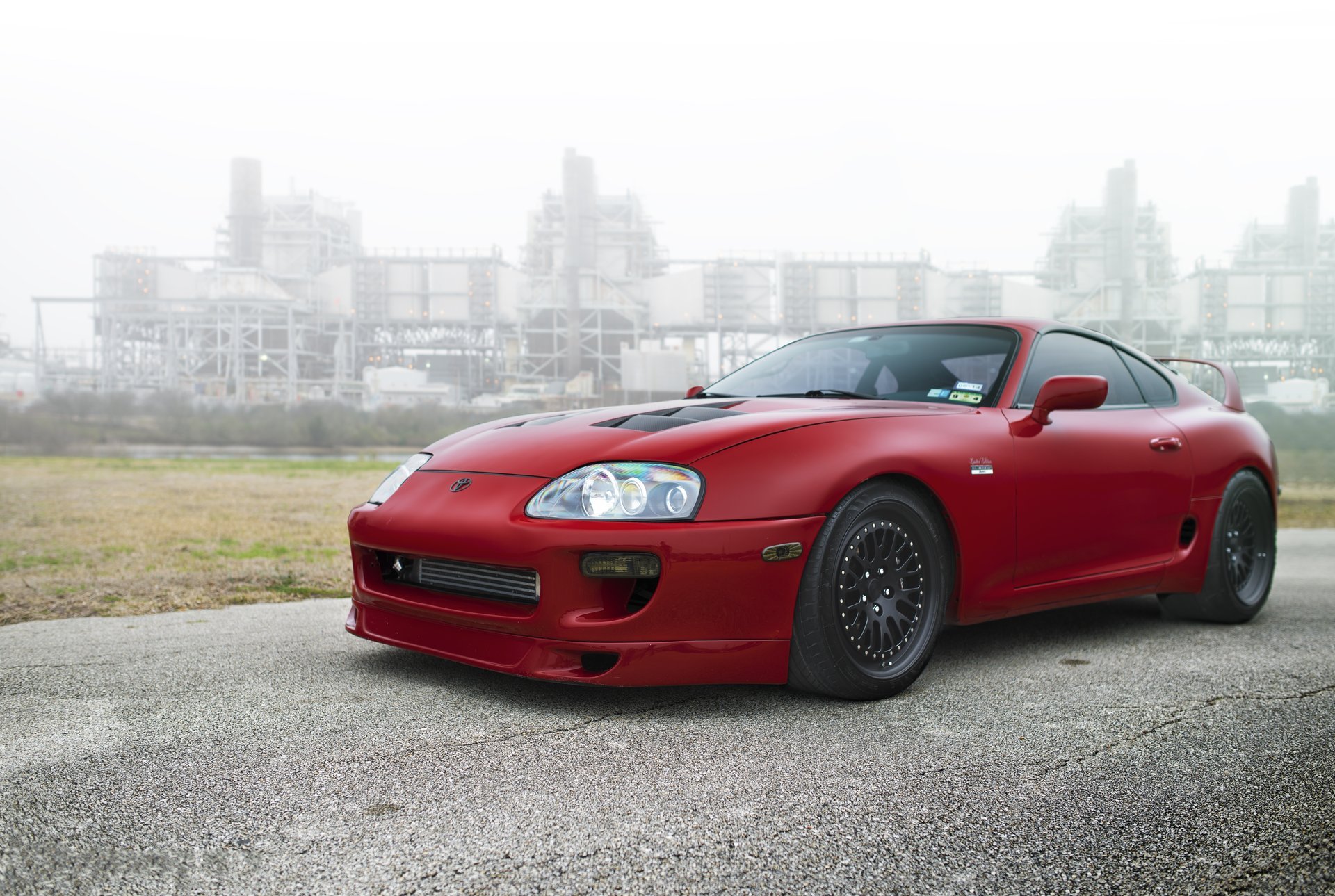 toyota above red toyota supra red rim