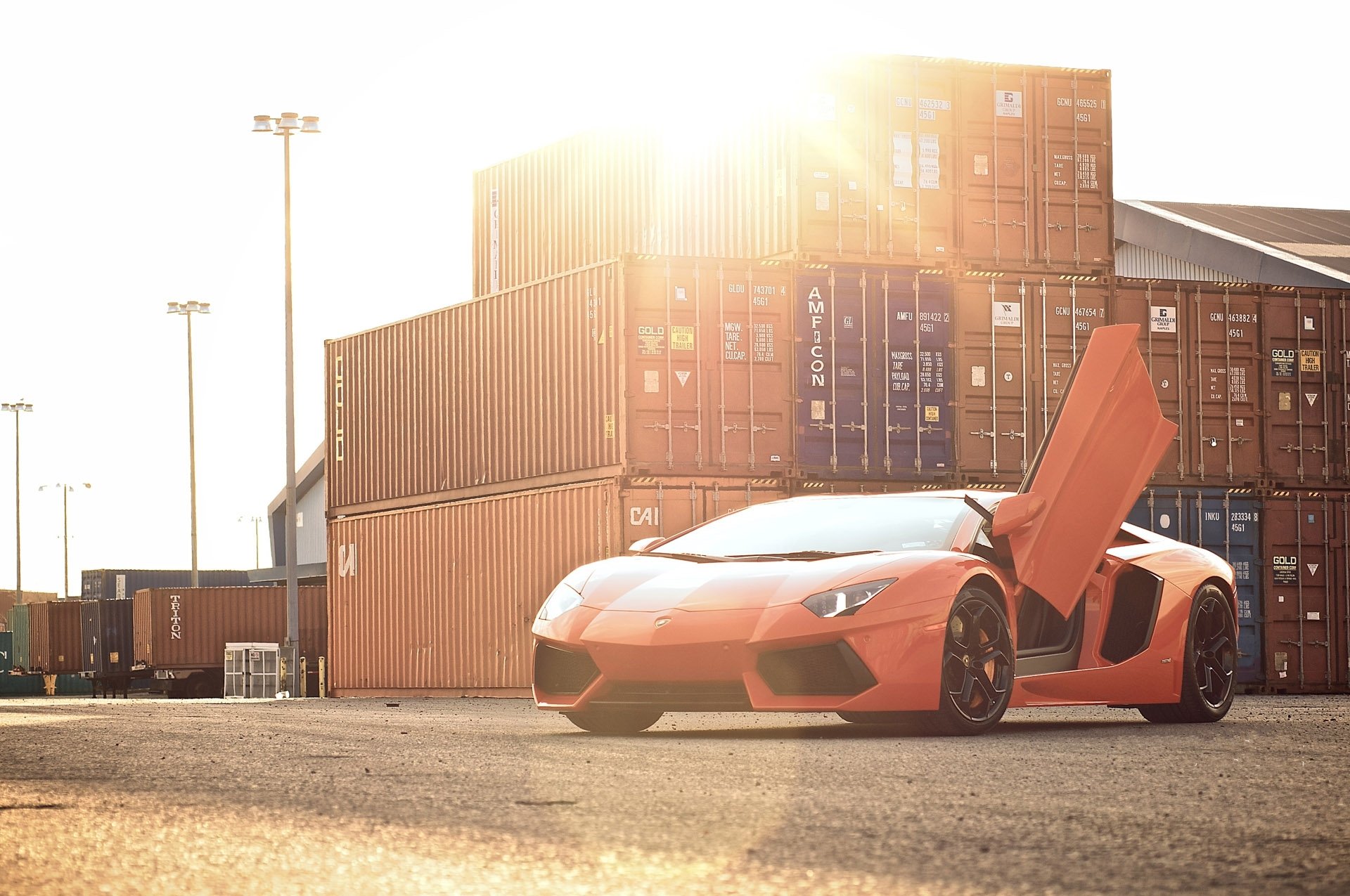 lamborghini aventador lp700-4 orange lamborghini aventador front view containers sky sun glare