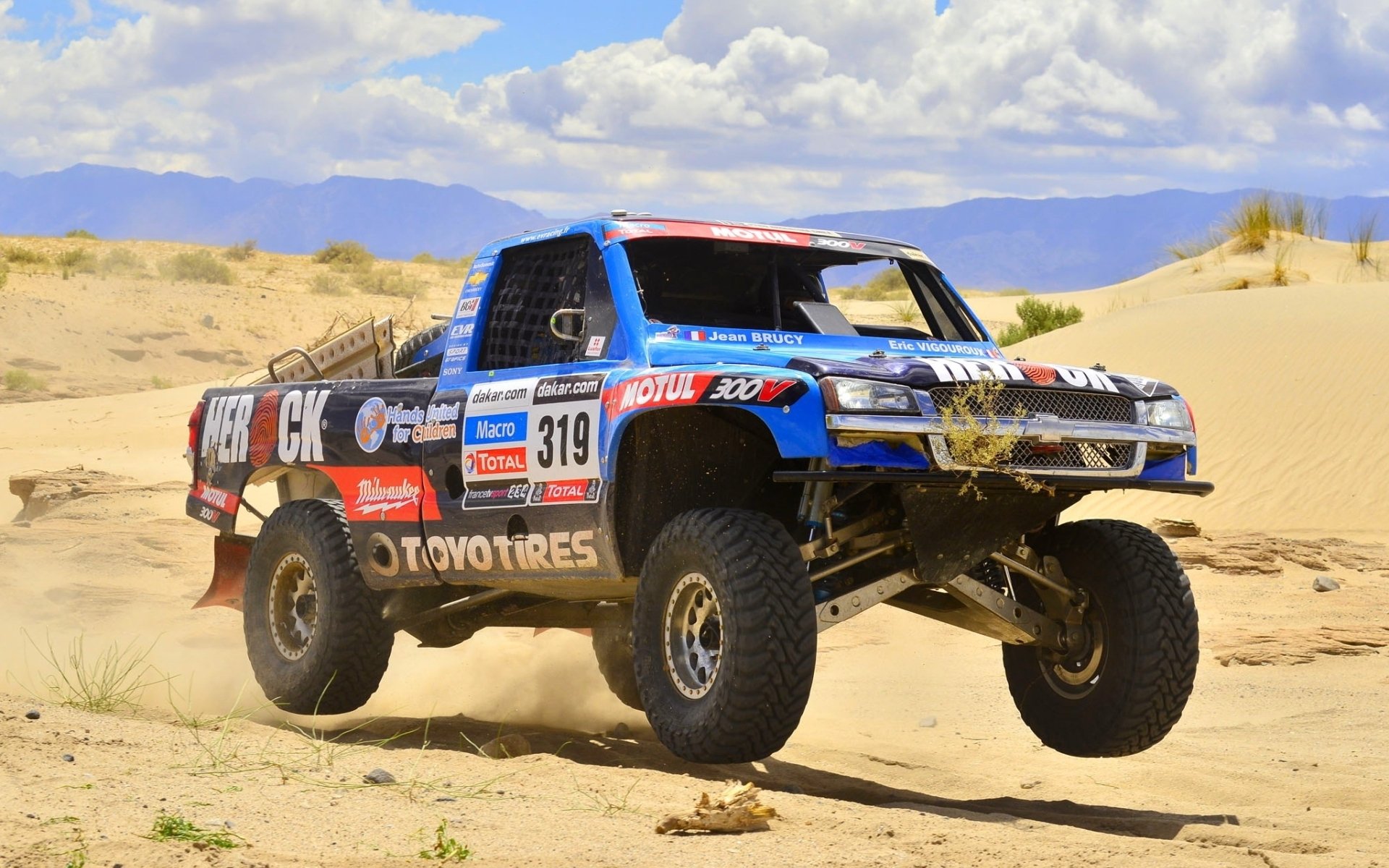 chevrolet silverado trophy truck chevrolet silverado pickup truck racing car front end sand sky