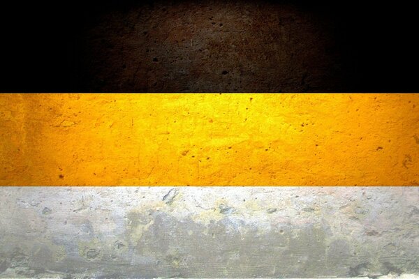 Флаг Российской Империи. Черно-желто-белый цвет на стене
