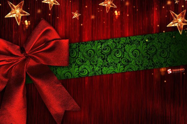Fiocco rosso regalo di Natale con nastro verde