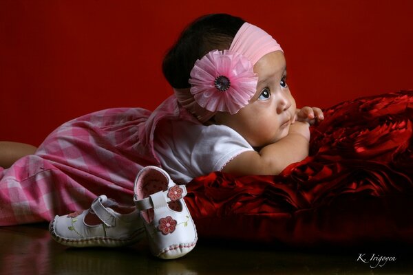 A little girl in beautiful clothes