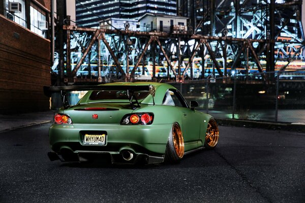 Green Honda at the auto show in the salon