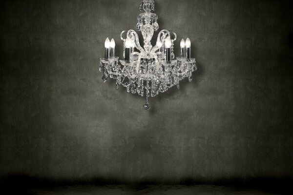 Chandelier on the background of the wall
