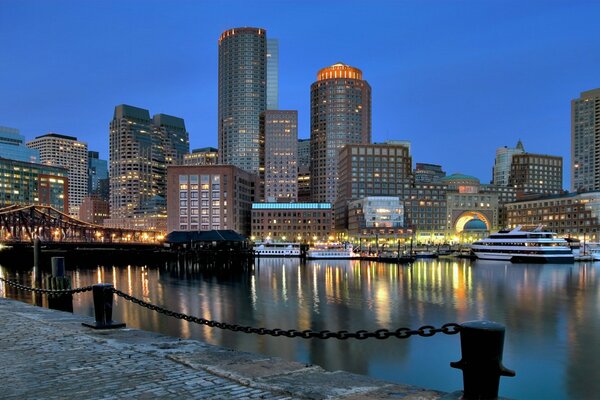 Beautiful evening cityscape on the background of the river