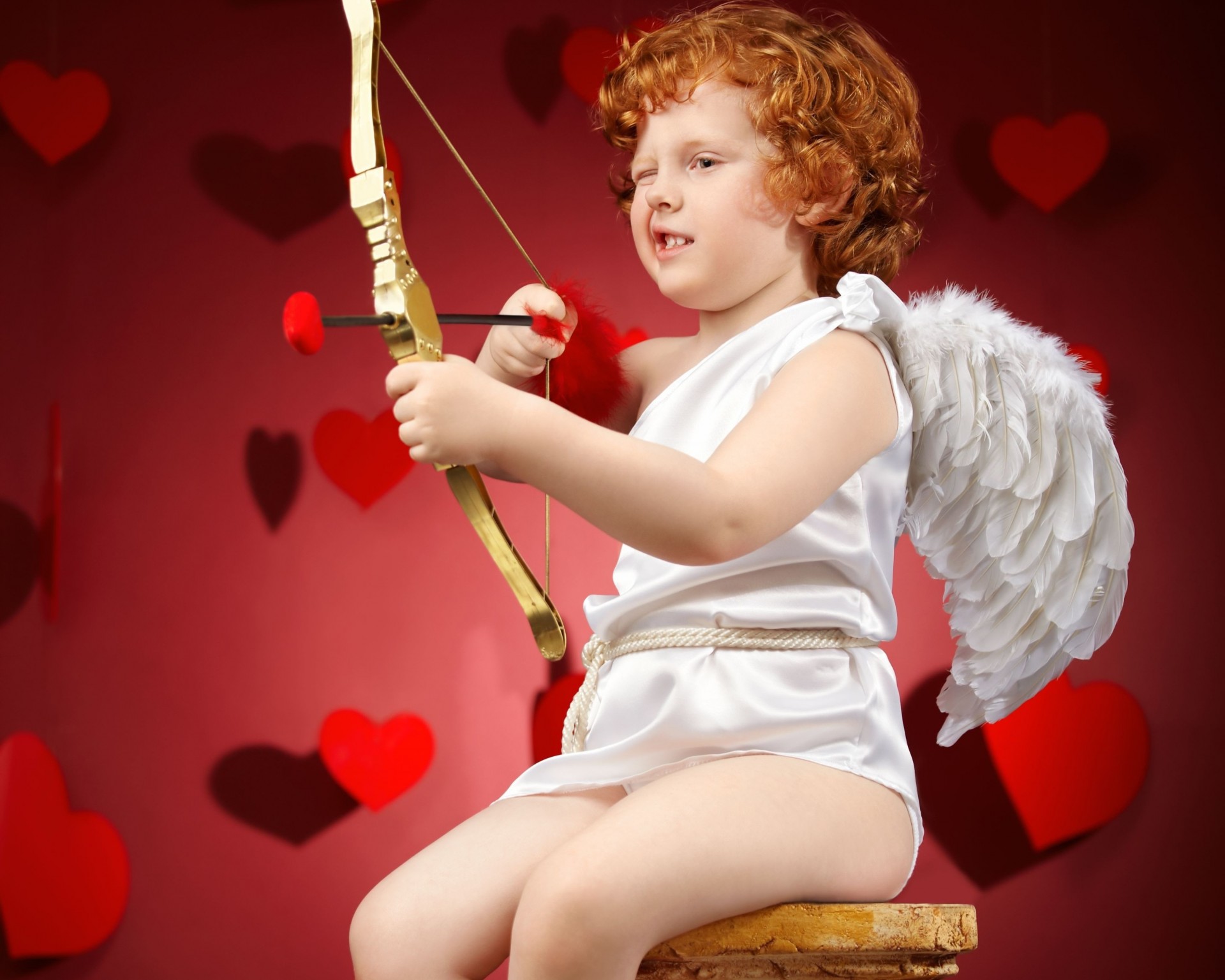 cupido niño arco