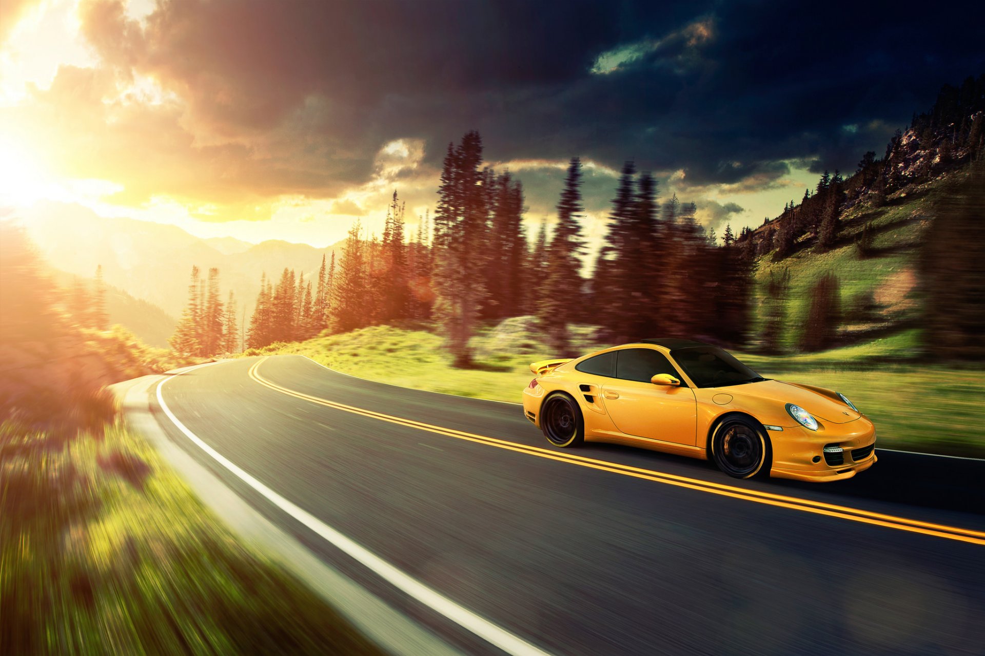 porsche 911 turbo żółty ronaldo stewart porsche góry słońce