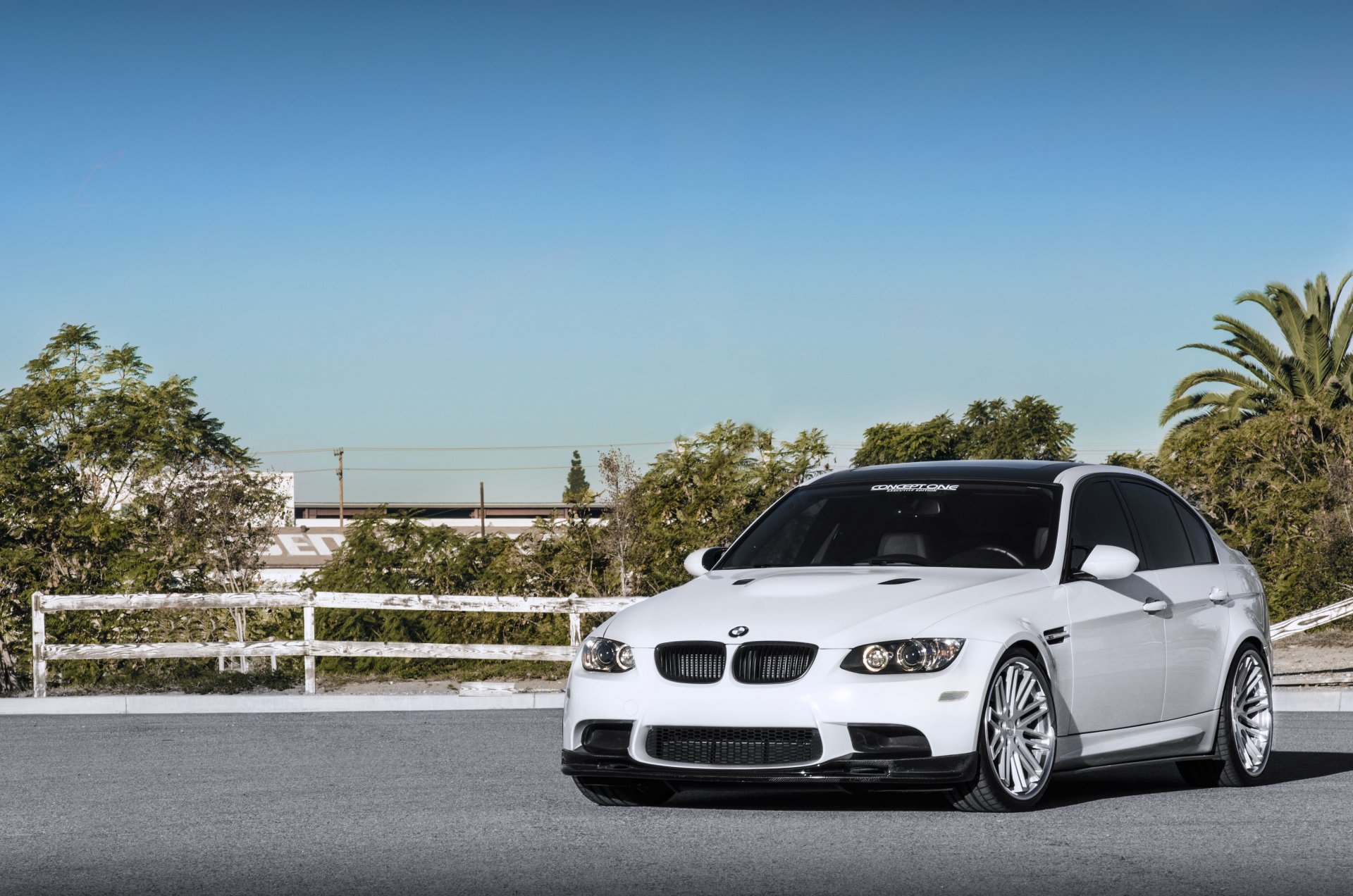bmw m3 e90 white bmw front view fence trees sky