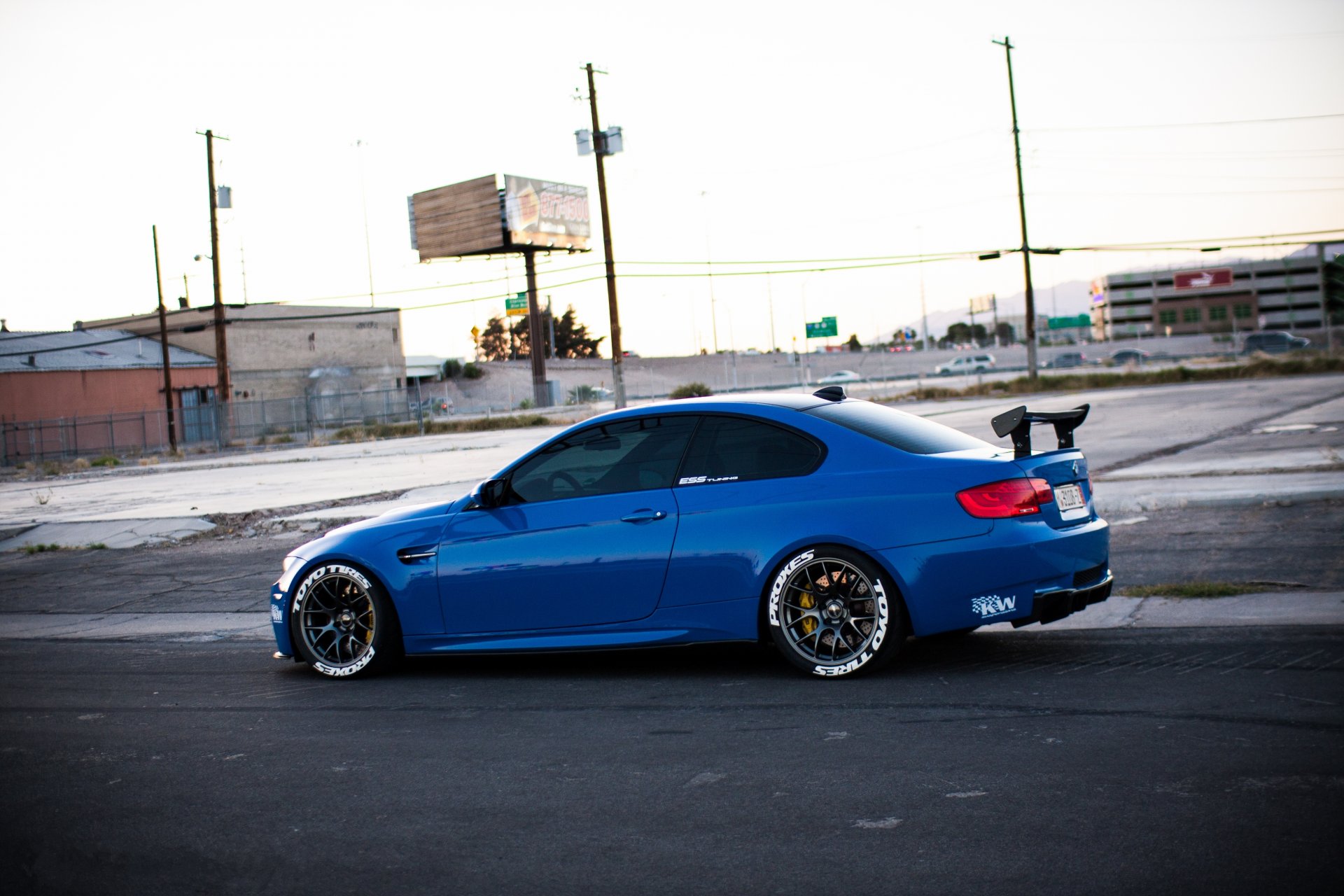 bmw m3 e92 blue bmw side view wing road street