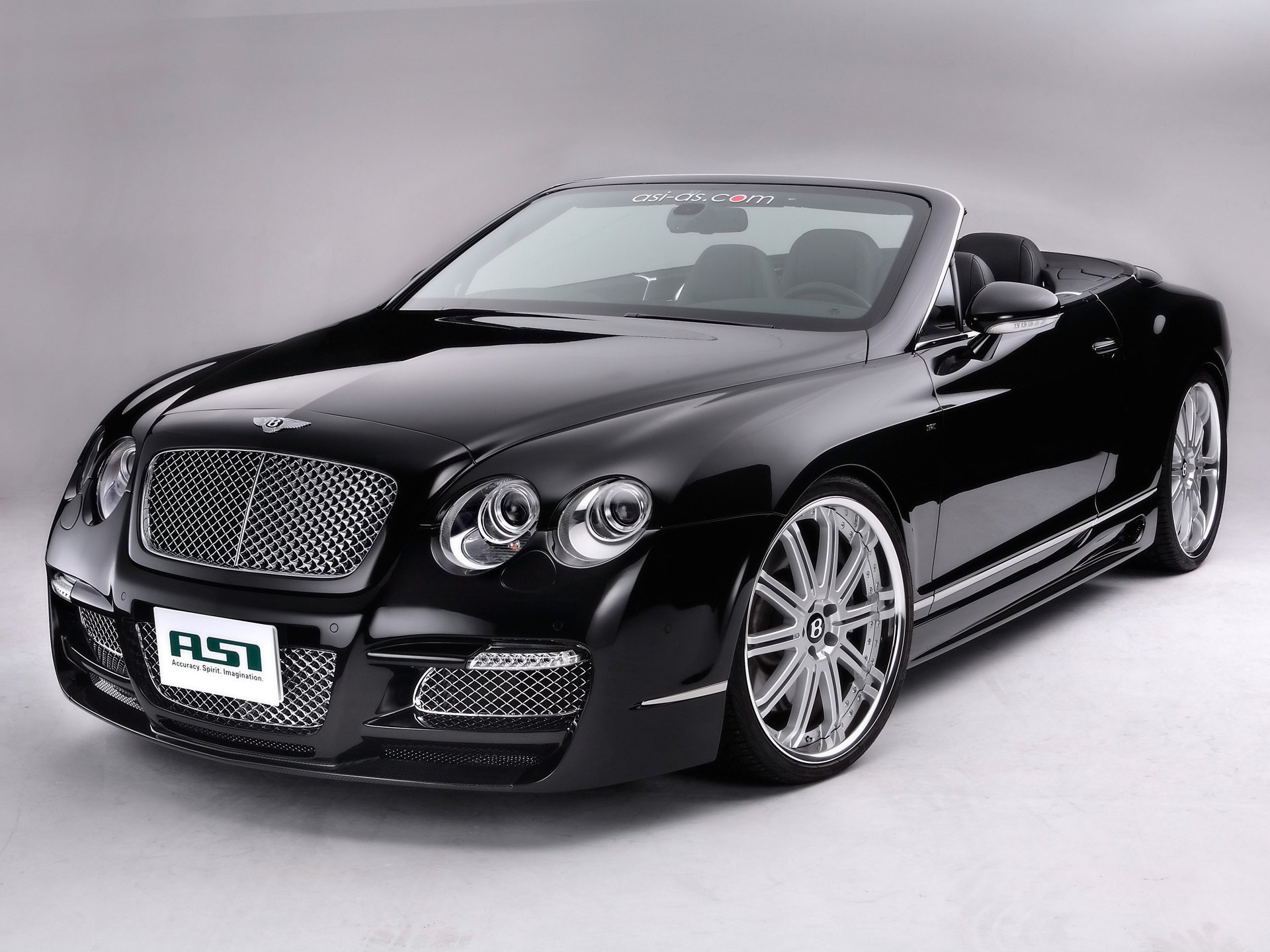 voiture bentley cabriolet noir jantes sur fond gris