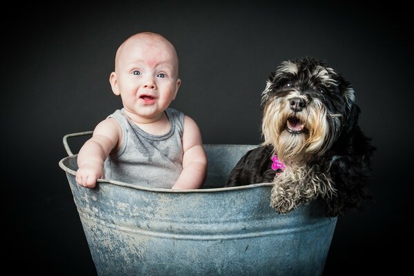 Funny boy and dog smile