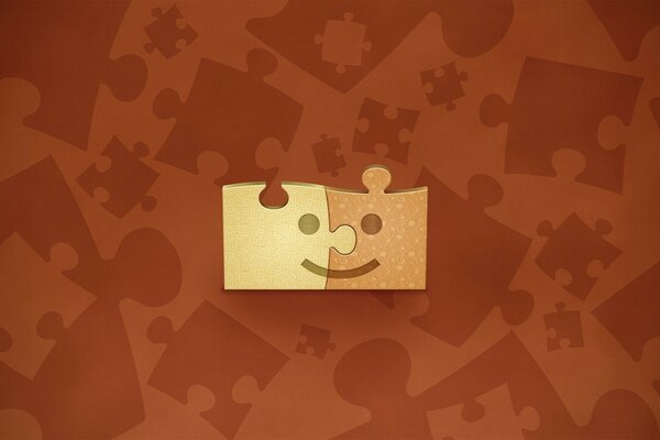 Smiley sorridente dagli elementi del puzzle