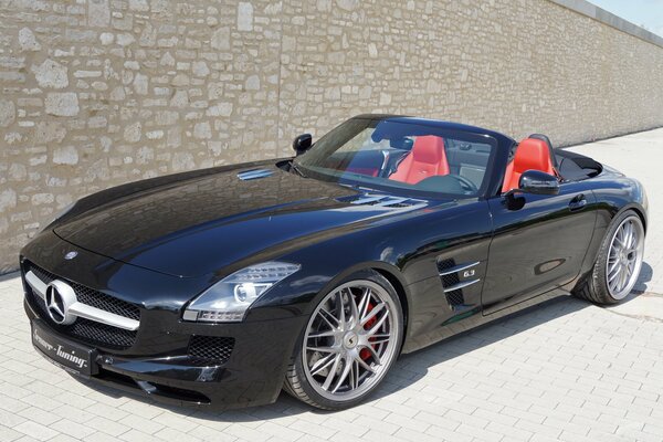 Mercedes-benz on the background of a brick wall