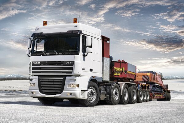 A huge truck with a white cab