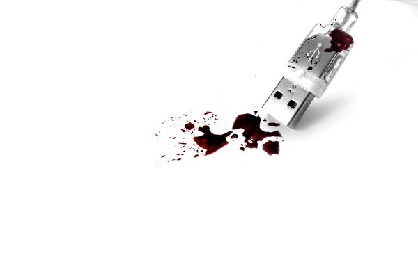 Z usb płynie krew na białym tle