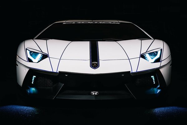 Lamborghini on a black background with lights on