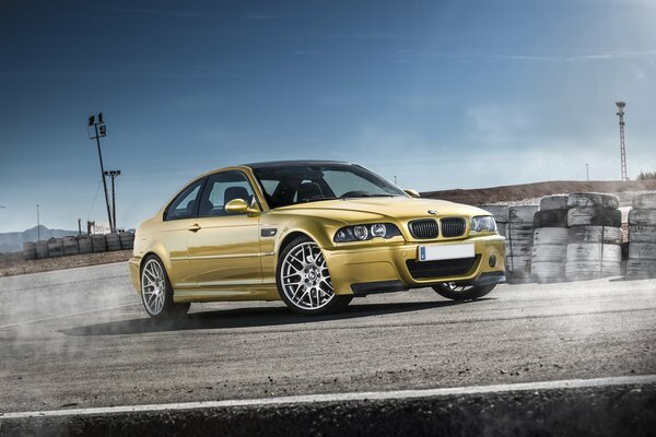 Bmw E46 in gold color on the highway