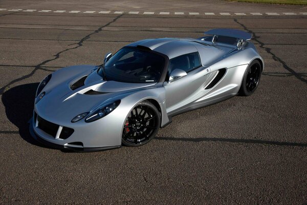 Hennessy s silver supercar on the road