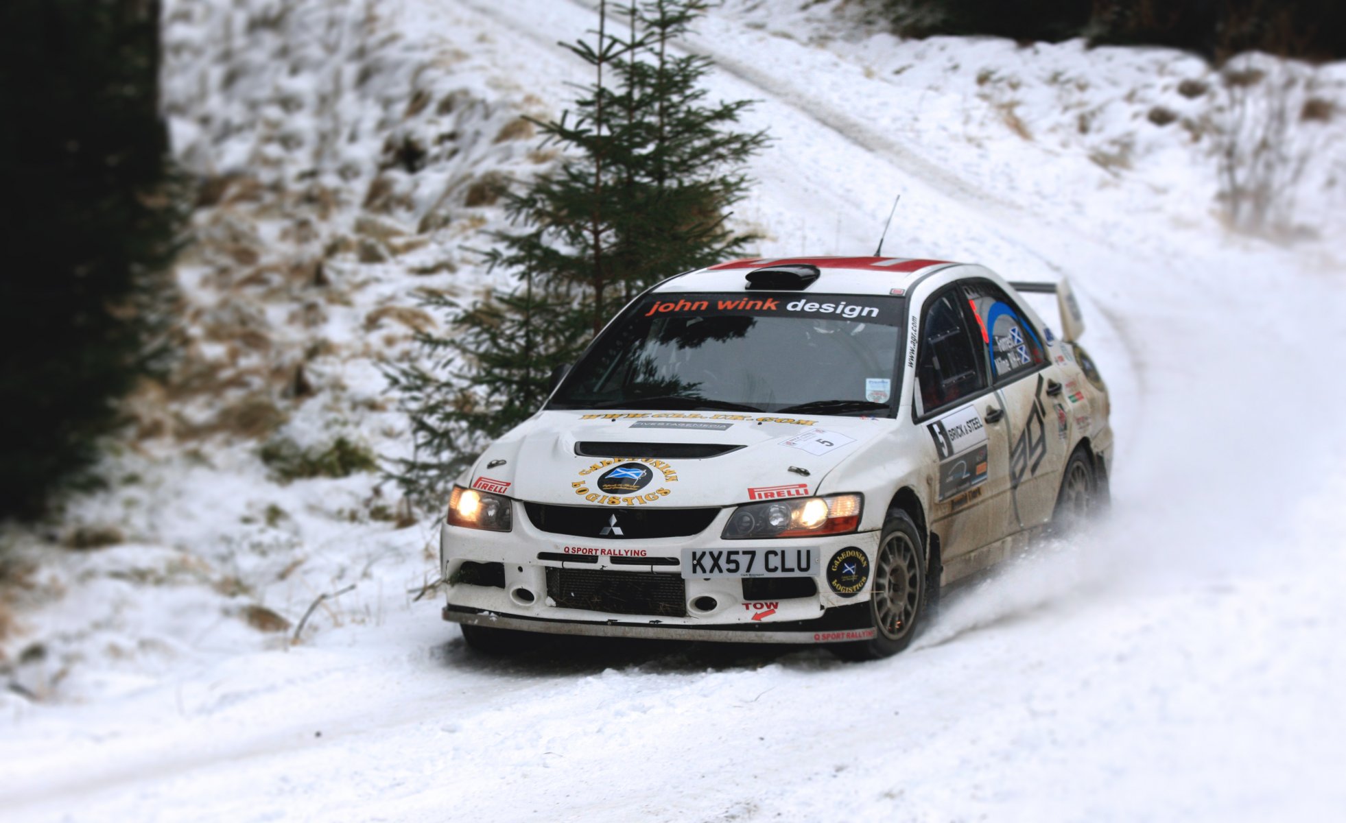 mitsubishi zawody zlot zima śnieg wyścig lancer przód rajd biały wrc sport