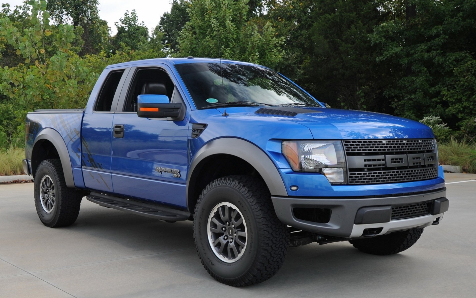 ford f-150 svt raptor supertaxi f-150 raptor camioneta jeep suv azul frente árboles fondo