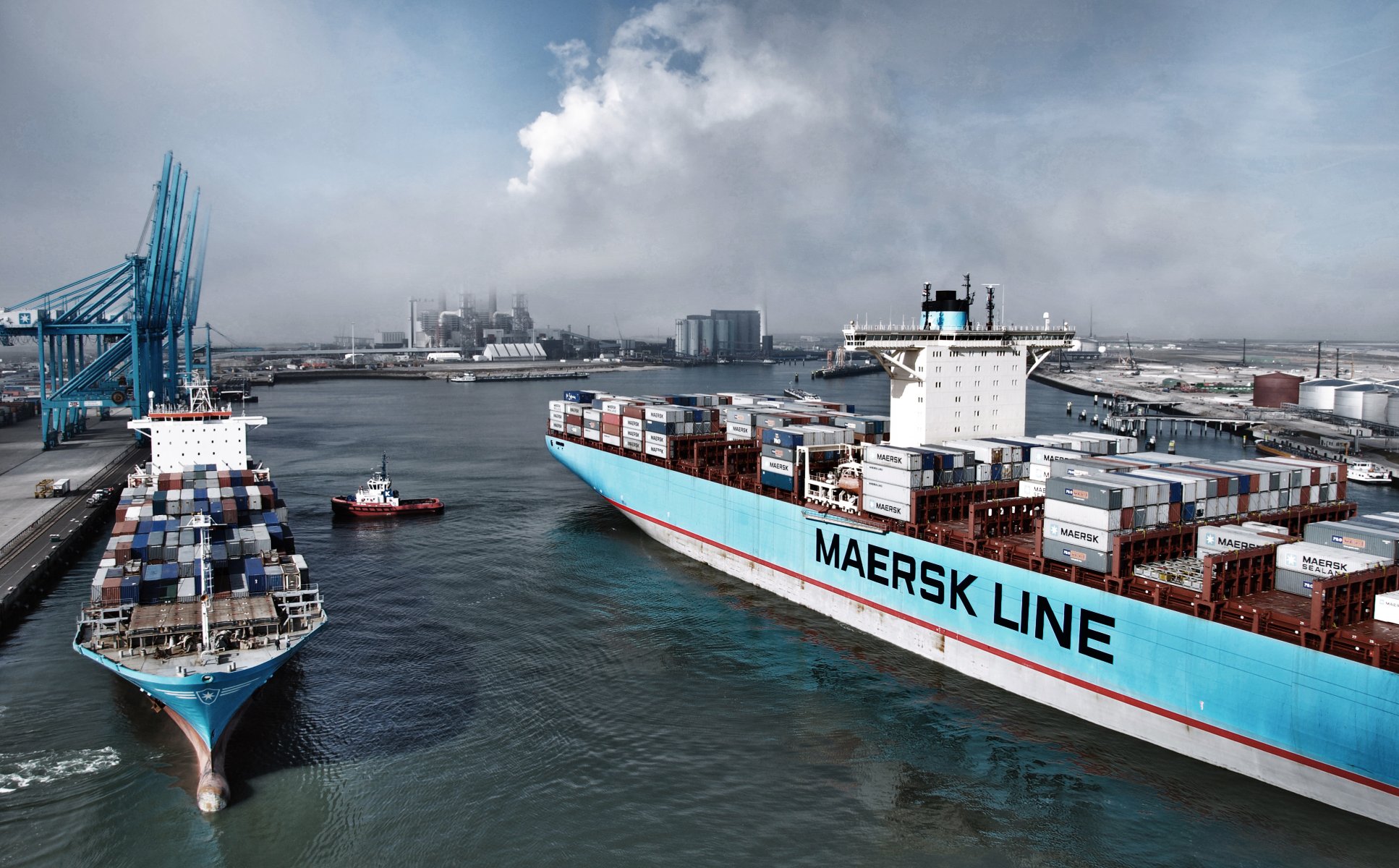 container maersk line maersk two ships freight trailers lift the port cranes pier waste smoke sea flight