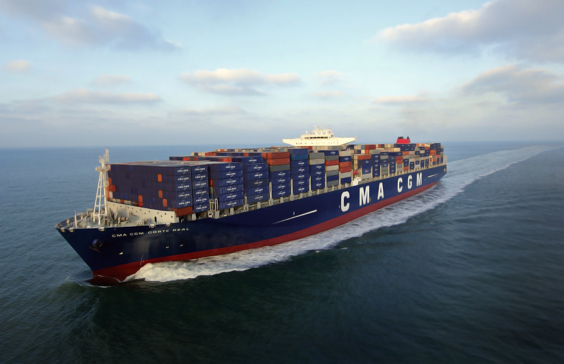 cma cgm corte real ships sea container on the fly tank day sky