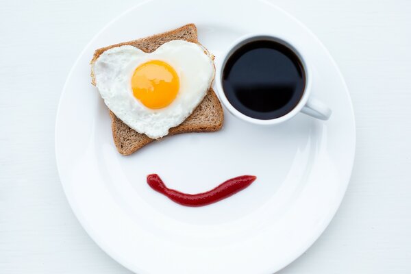 Breakfast of scrambled eggs with bread and coffee