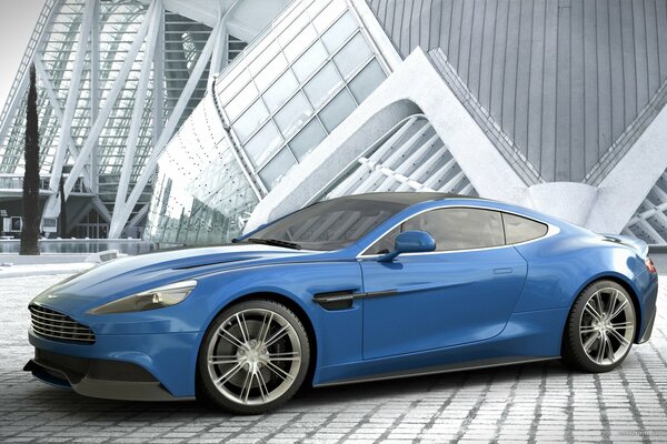 Blauer Aston Martin Vanquish auf High-Tech-Architektur Hintergrund