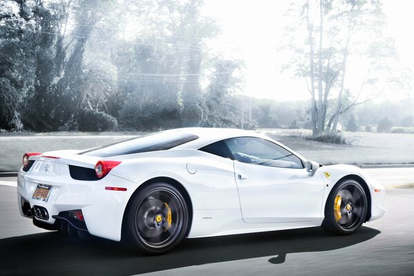 Beautiful white ferrari rides at speed