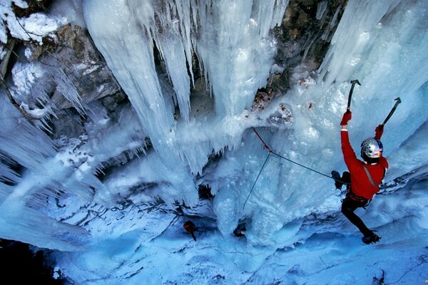 Very long icicles on a snowy mountain