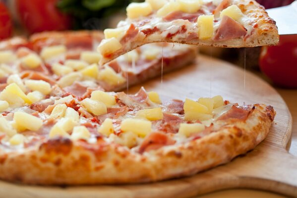 Juicy pizza with pineapple and bacon