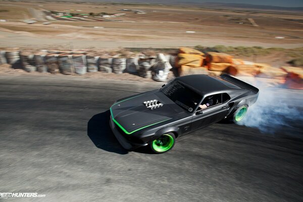 Black Ford Mustang RTR-x with smoking wheels