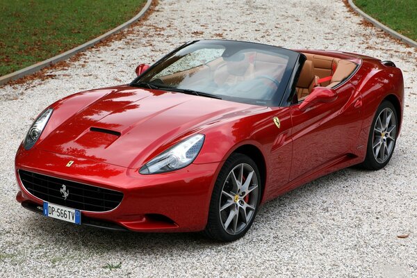 Red sports car with brown interior